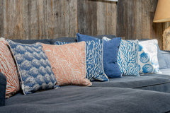 Kate Stein Designs - Repeat orange coral on natural cushion